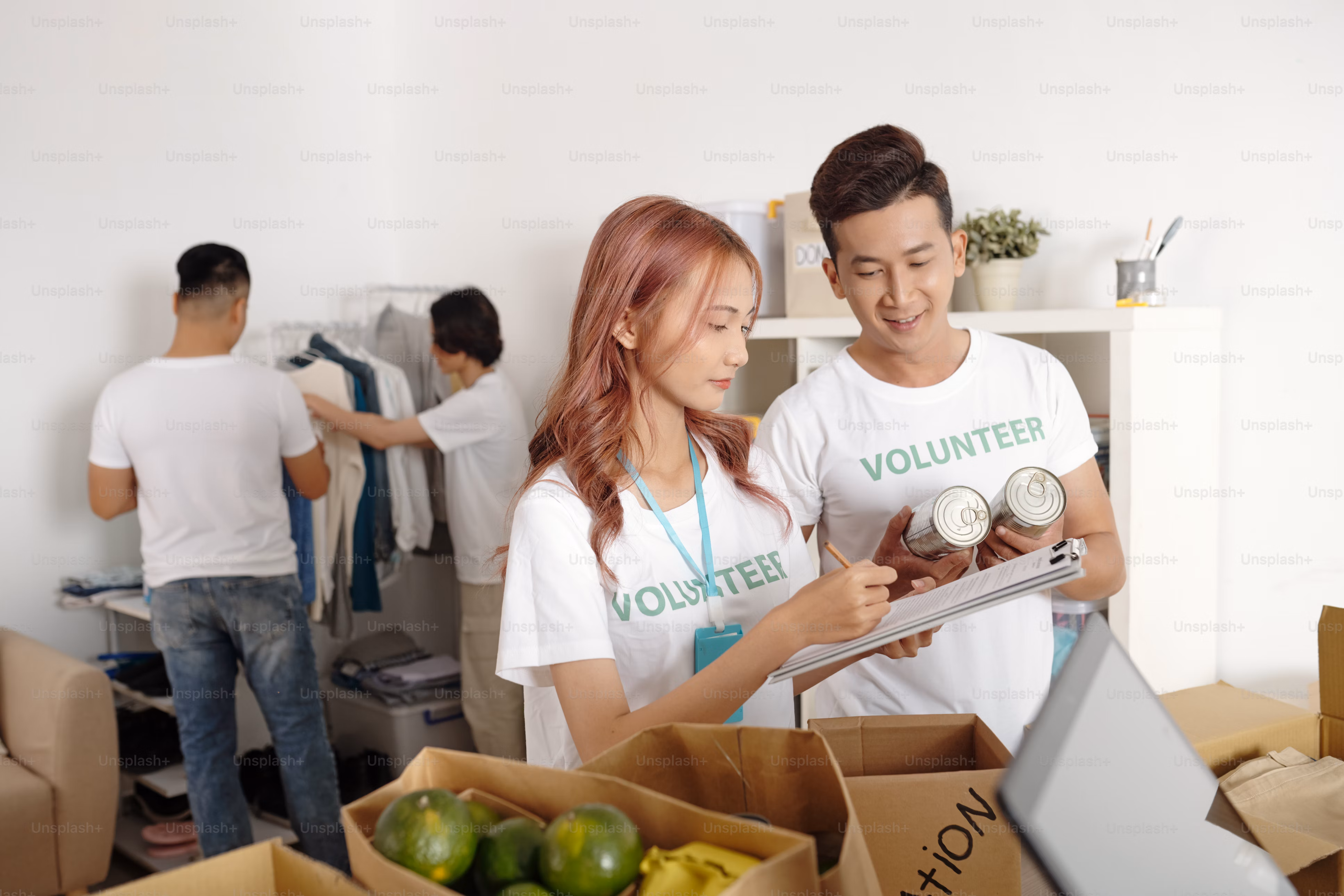 Volunteers smiling and walking through a neighborhood.